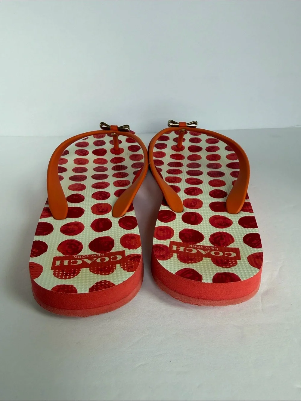 COACH Amel Coral Orange Polka Dot Flip Flops Sandals Gold Bow Women’s 7–8